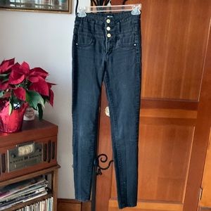 Faded black skinny jeans by Refuge.